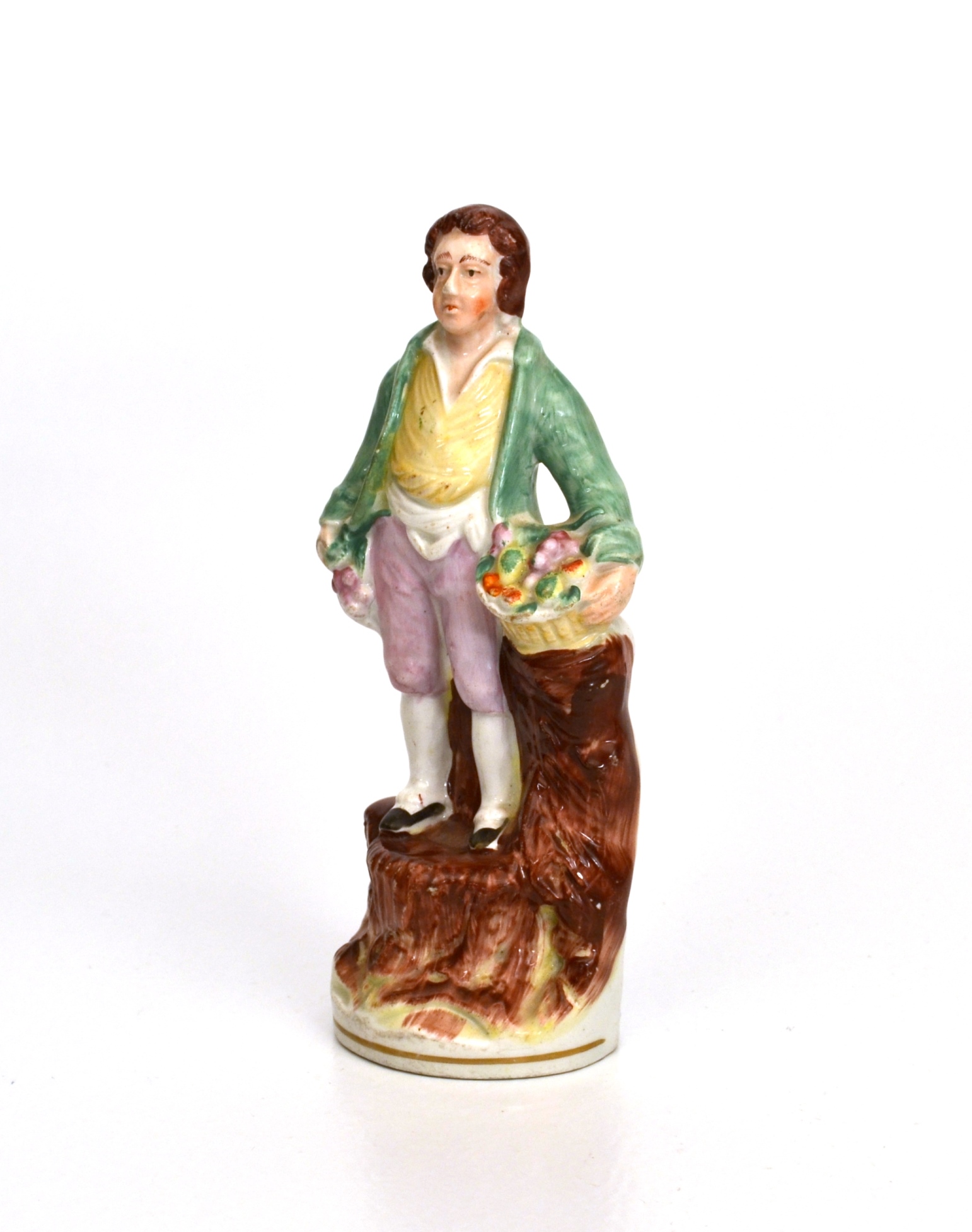 Staffordshire Figure of a Boy with Flowers