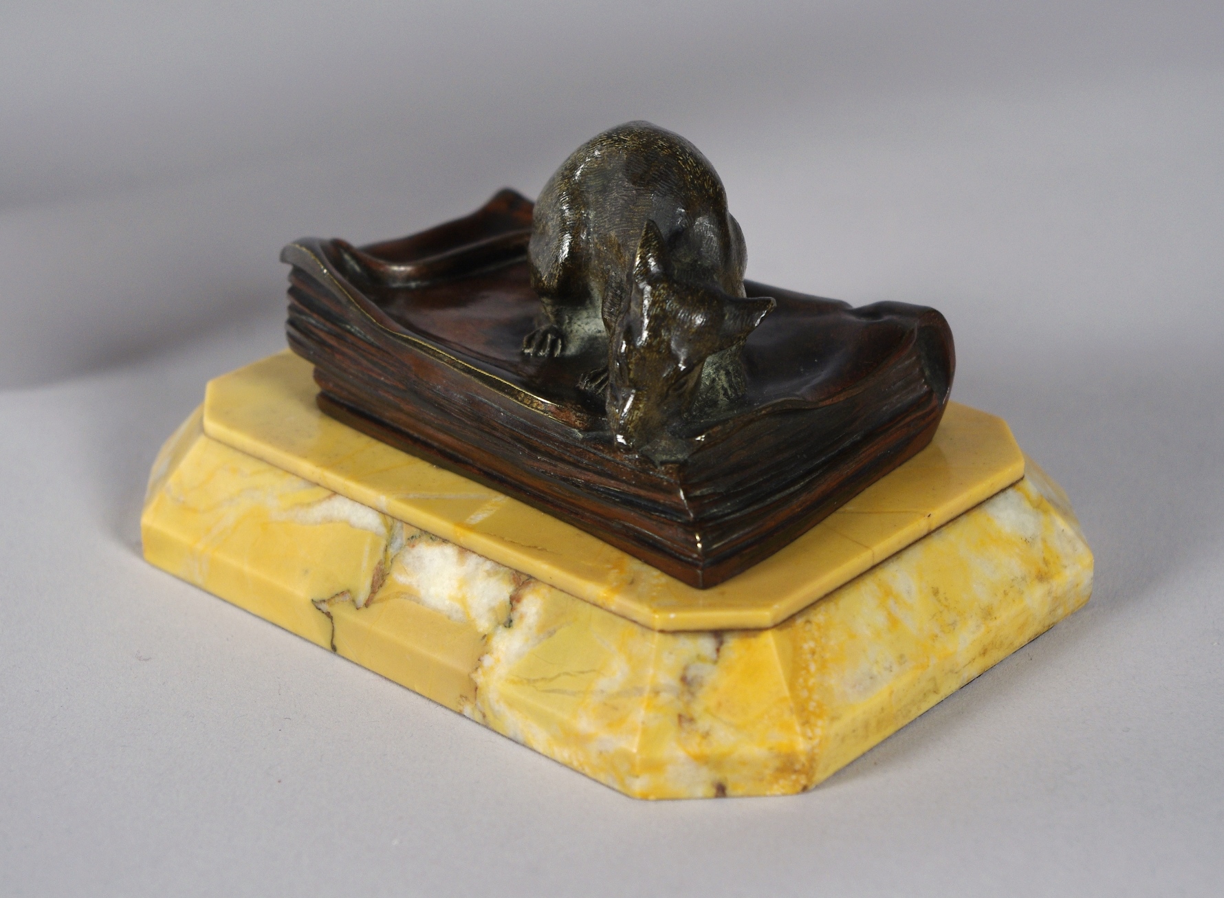 Bronze Figure of a Mouse Eating a Book