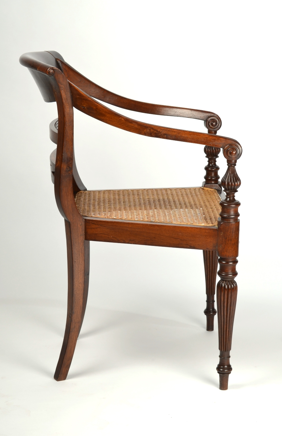 Four British Colonial Hardwood Open Armchairs